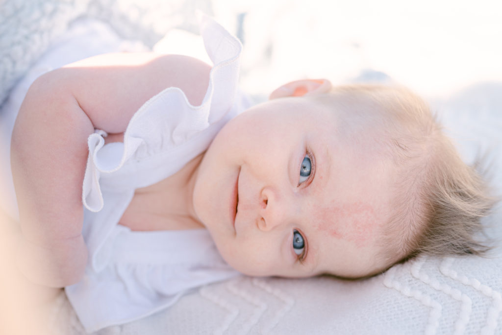 Portrait of a 2 month old baby with blue eyes in South Florida