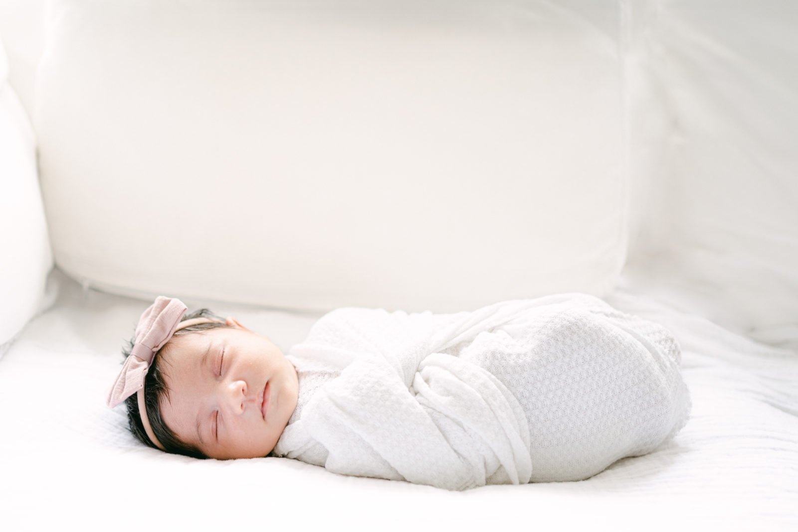 Newborn baby girl sleeping portrait