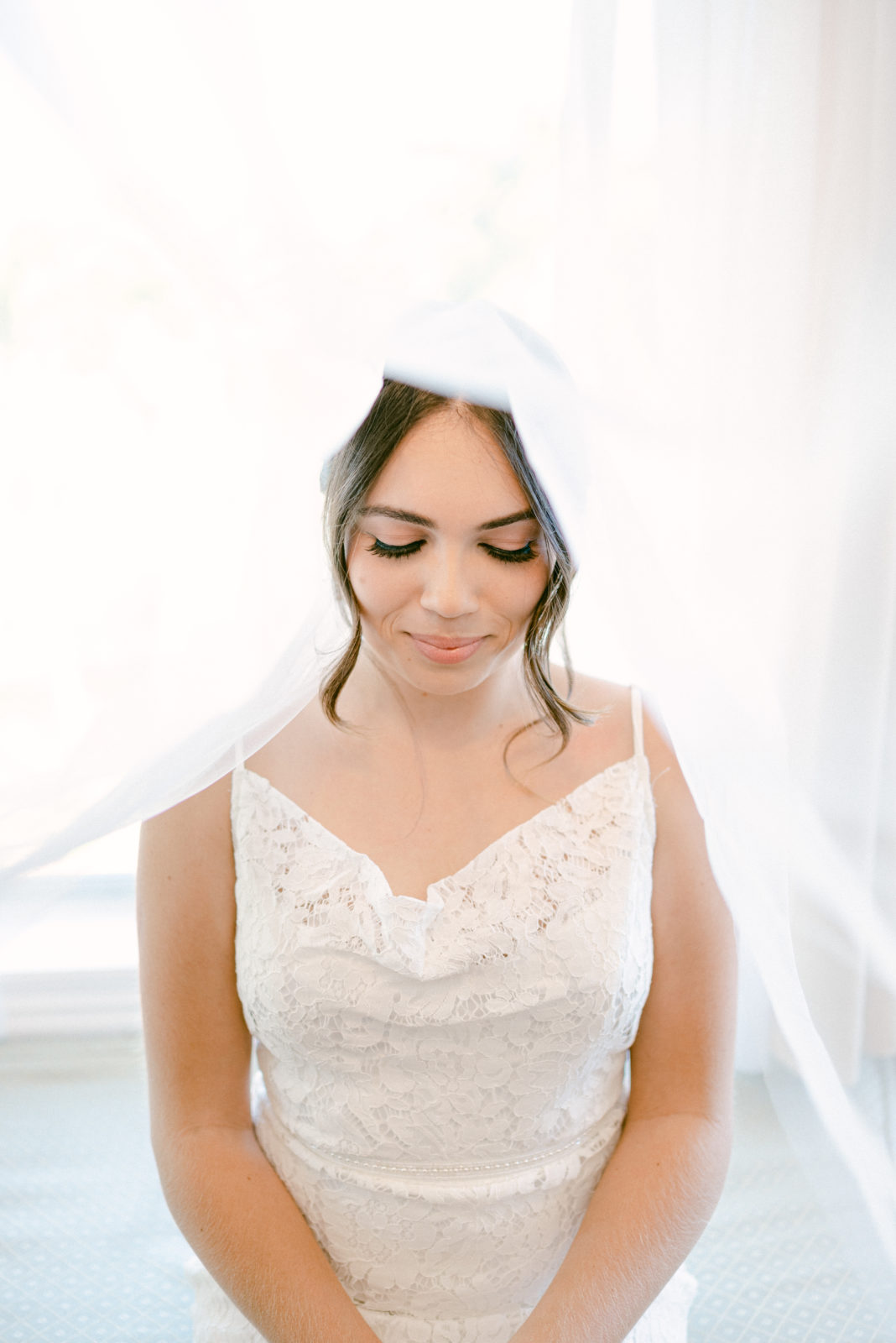 Bride under veil for her Backyard Elopement in Miami