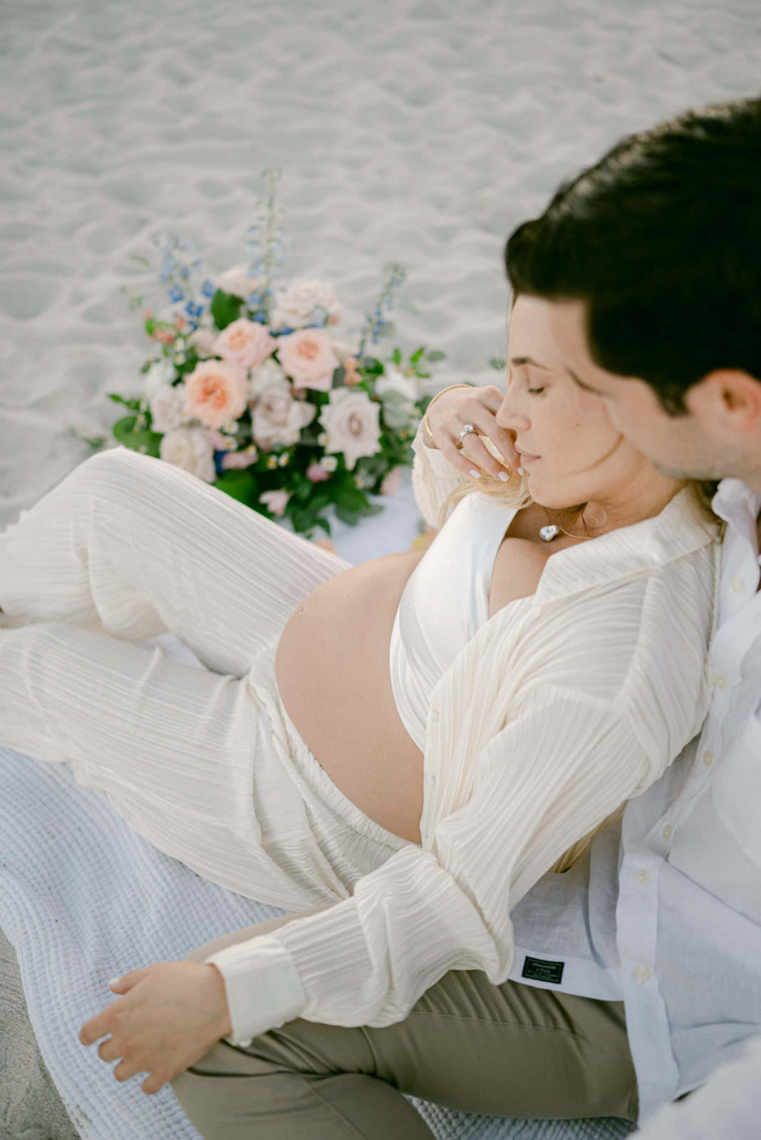 Maternity photoshoot in Key Biscayne on the beach with flowers