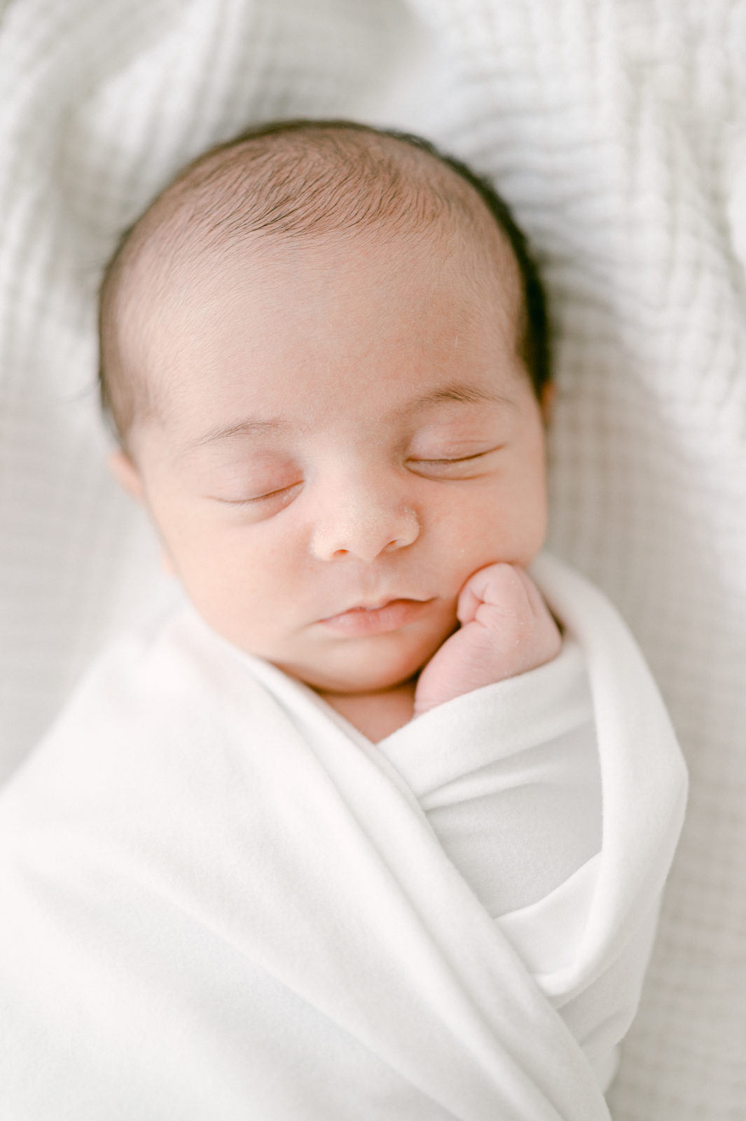 Lifestyle newborn portrait of baby