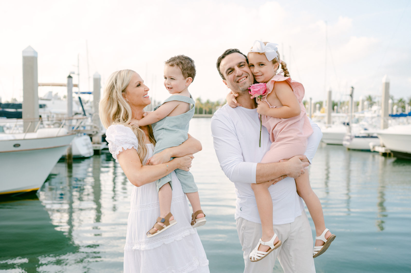 Family photos at the Marina with boats in Key Biscayne