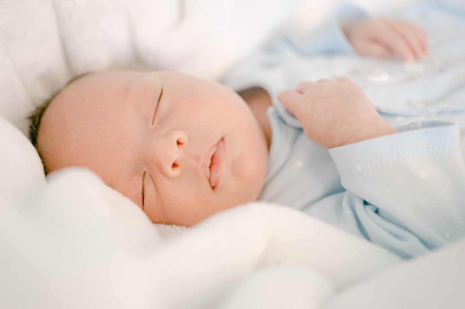 At home newborn baby sleeping during newborn session 