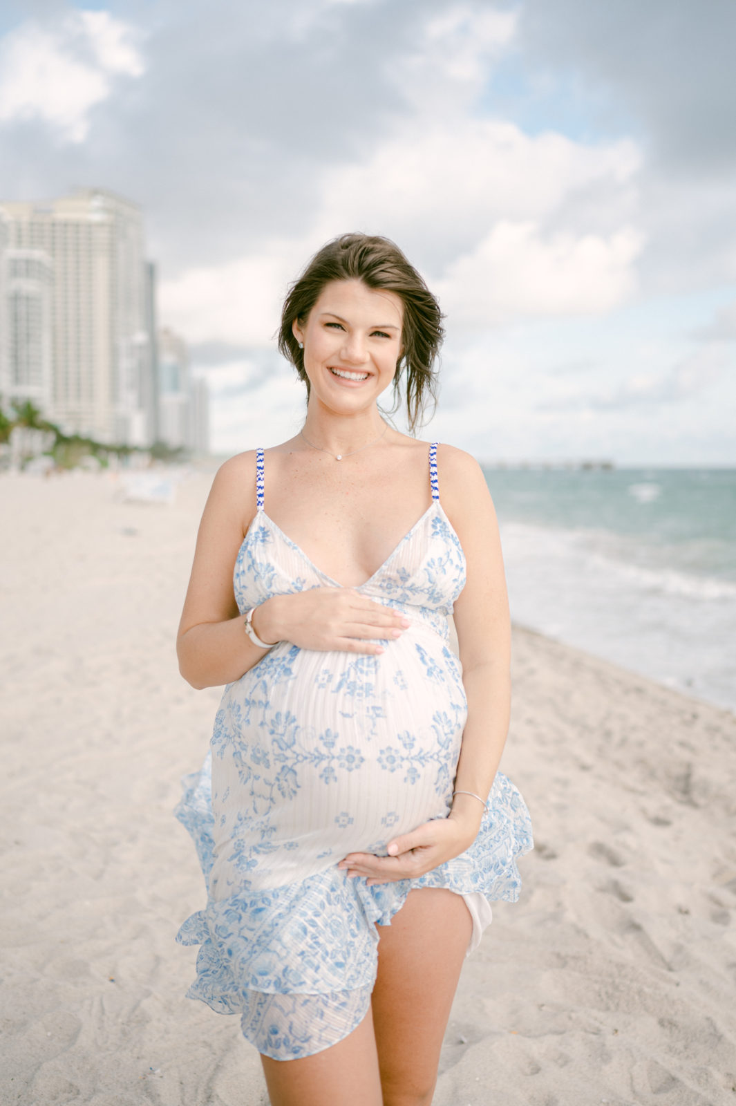 Maternity photos in Bal Harbour Beach pregnant mom smiling