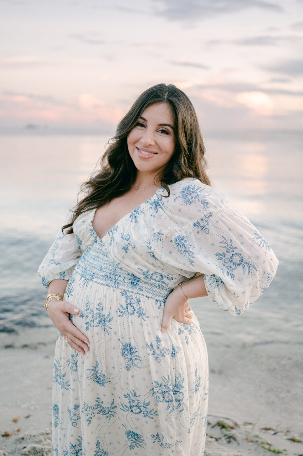 Maternity photo shoot at the beach during sunset
