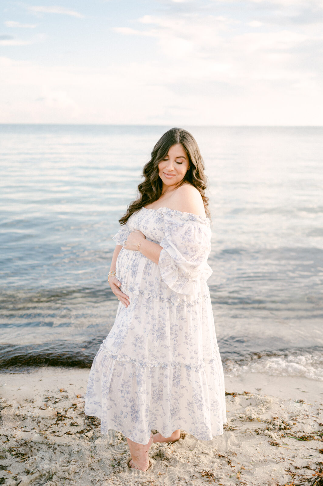 Glowing pregnant mama during her Miami maternity shoot on the beach