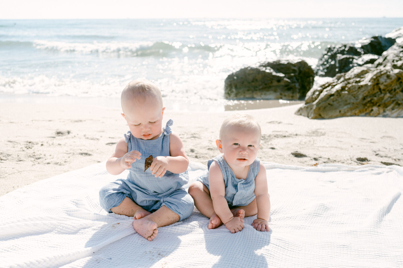 Baby cousins having fun on the beach
