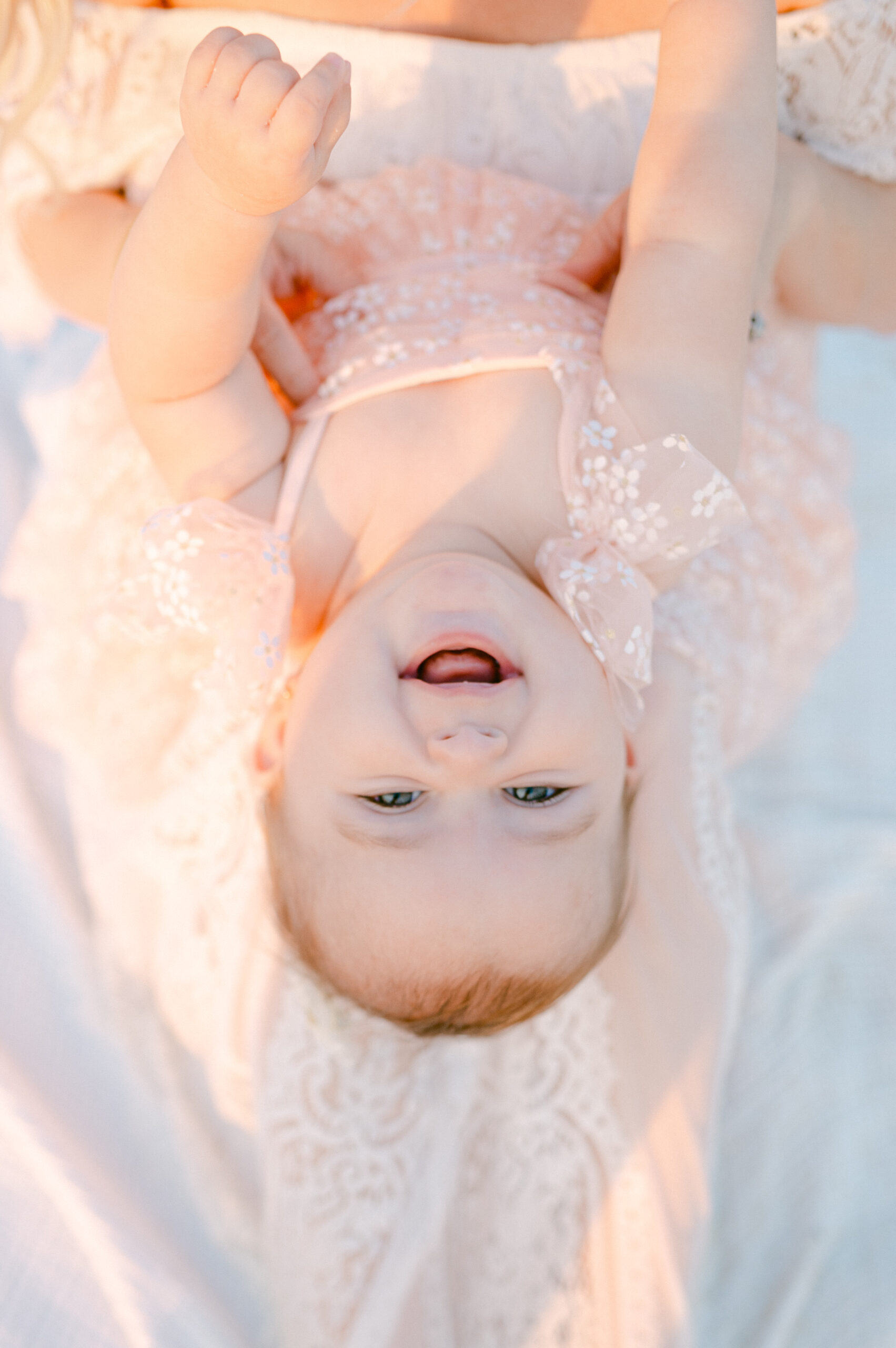 Upside down happy baby by Miami Photographer