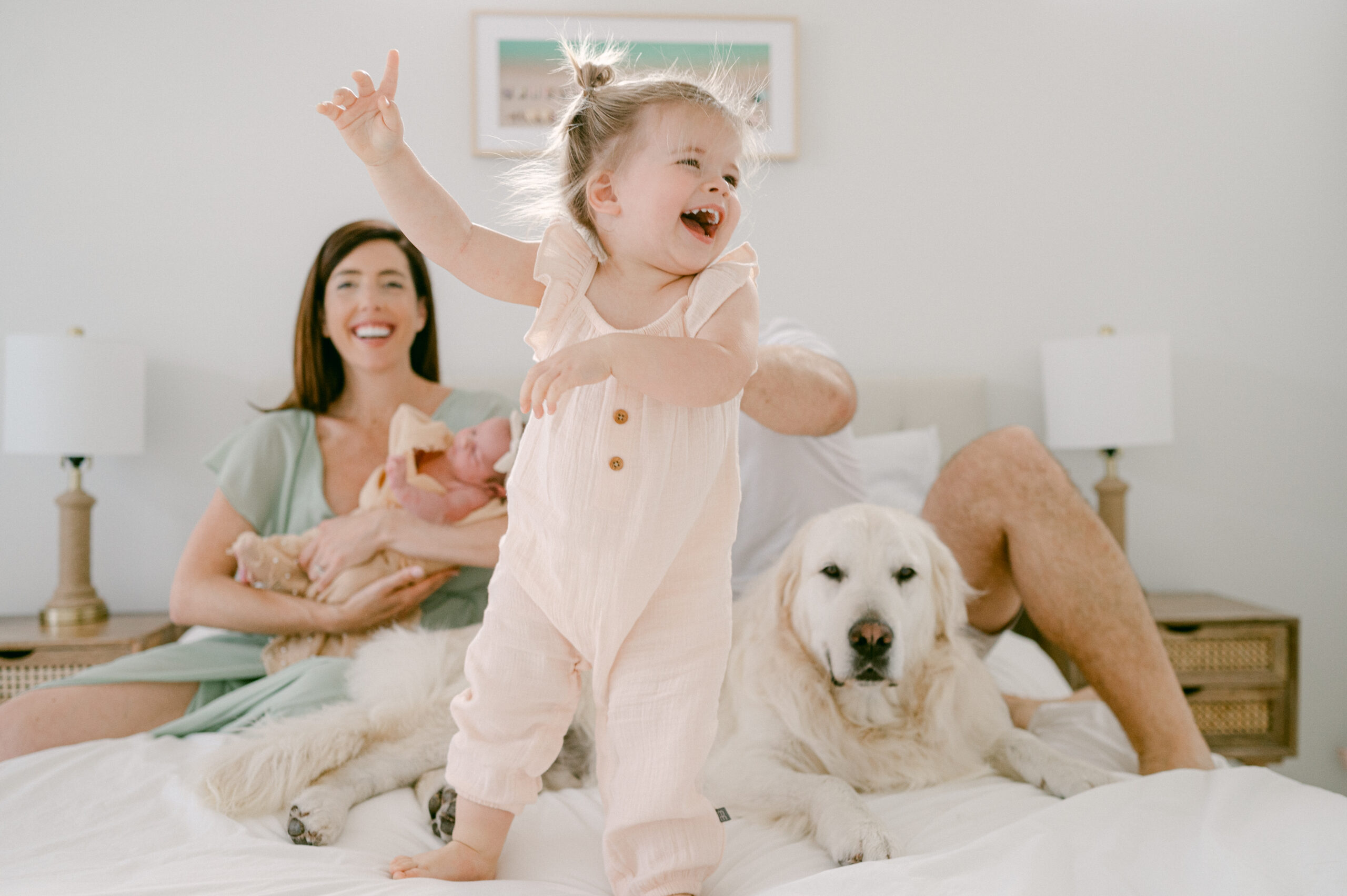 Toddler jumping on the bed during Fort Lauderdale Photoshoot