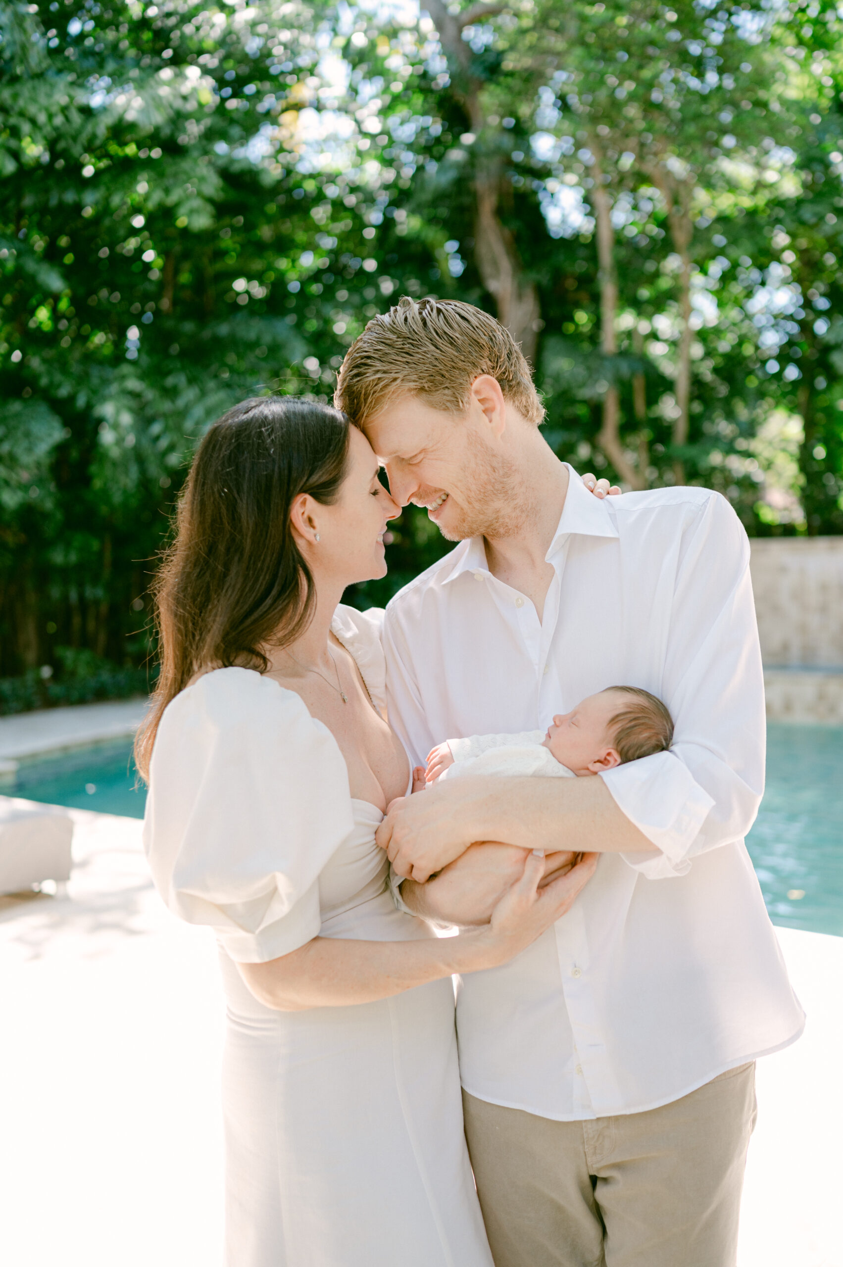 Outdoor newborn session by the pool