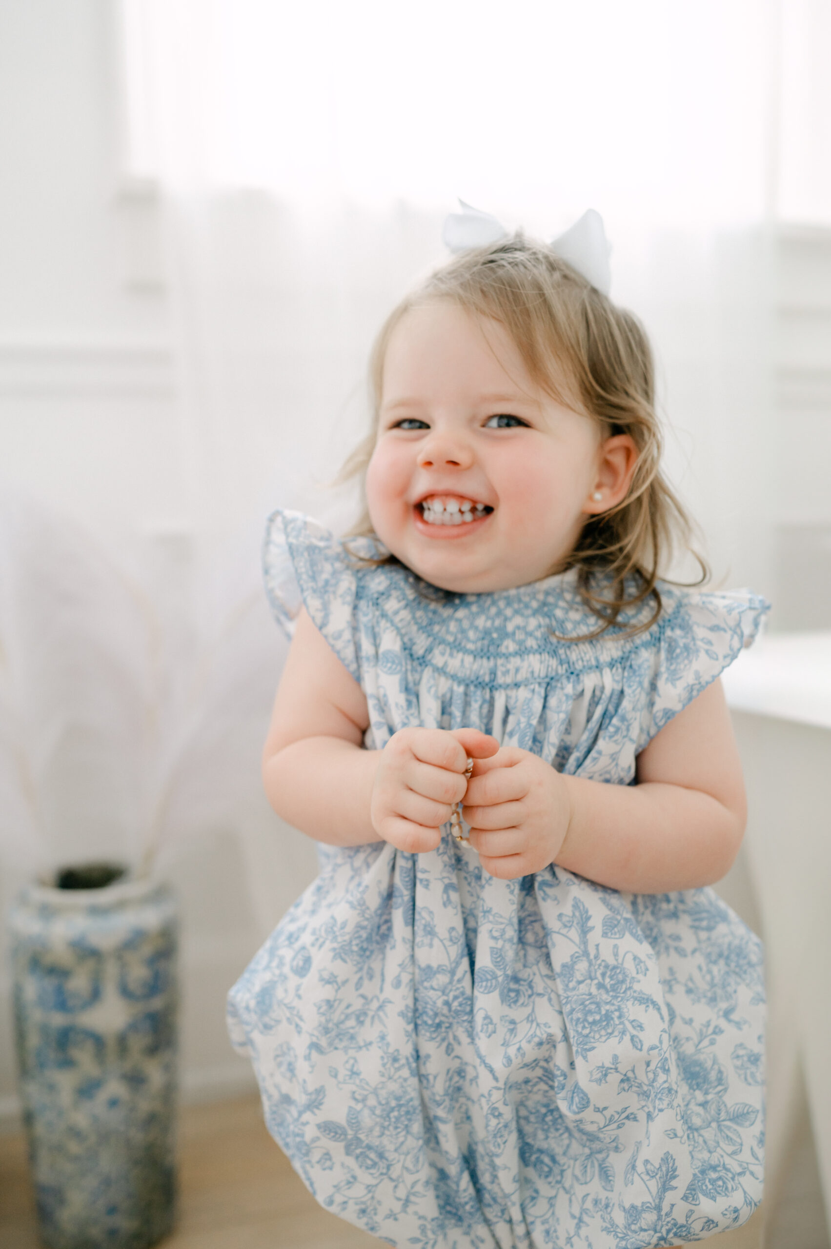 Excited toddler girl captured by Miami family photographer