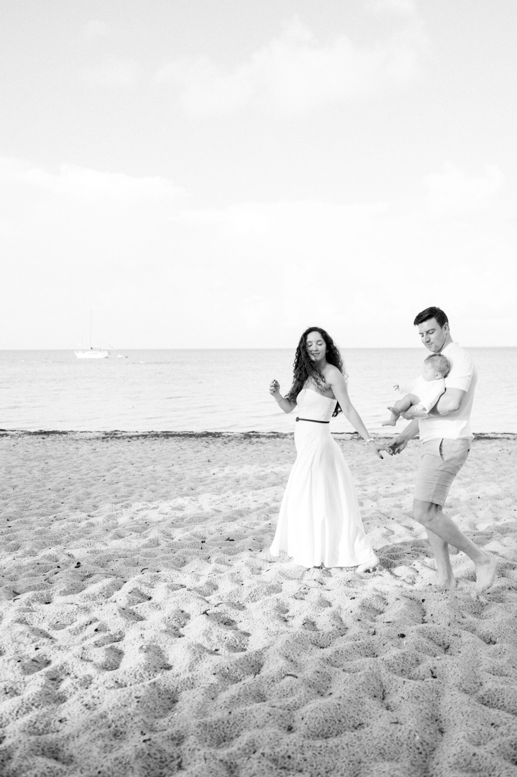 Family walking on the beach