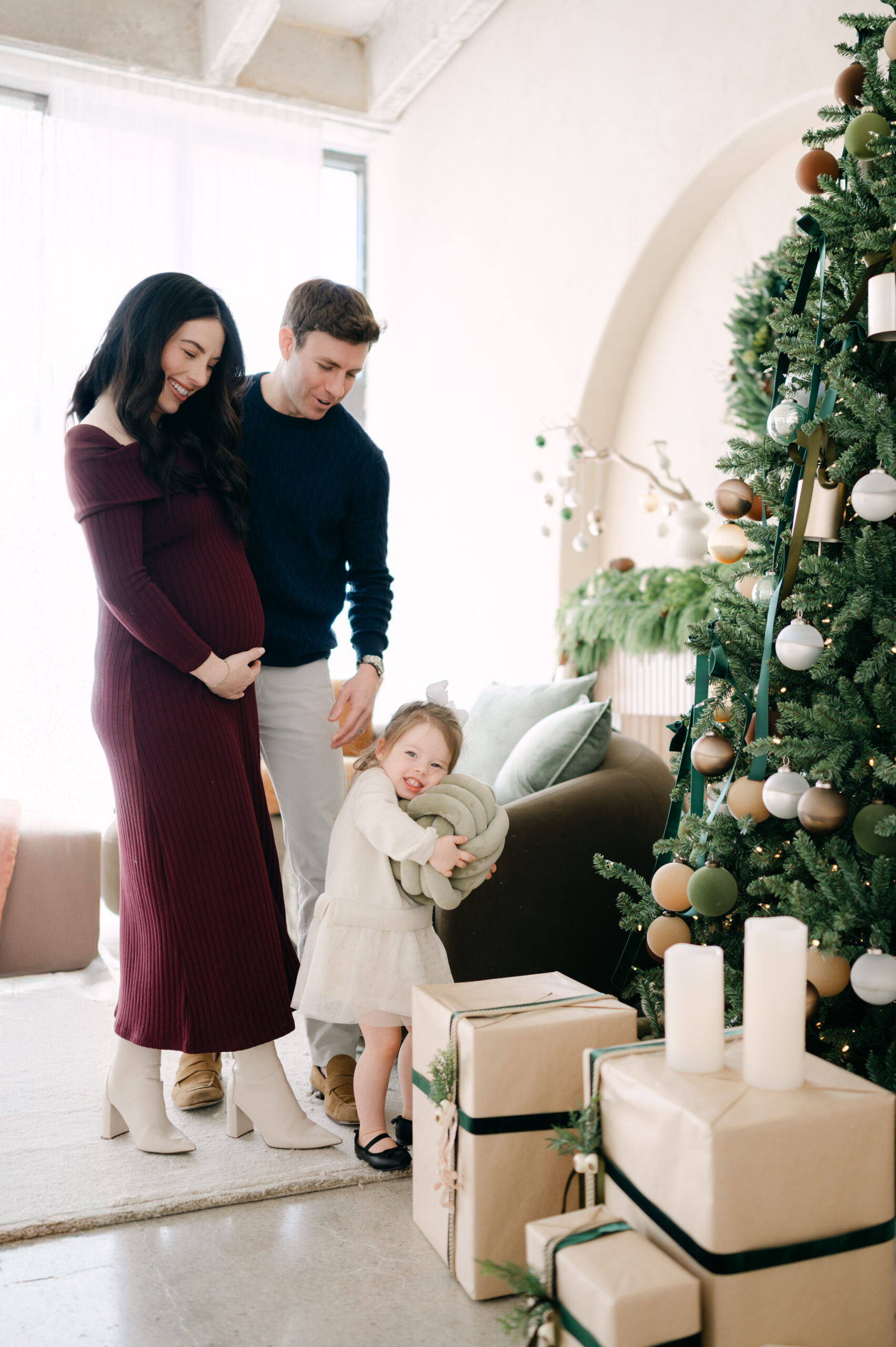 Family around the Christmas tree