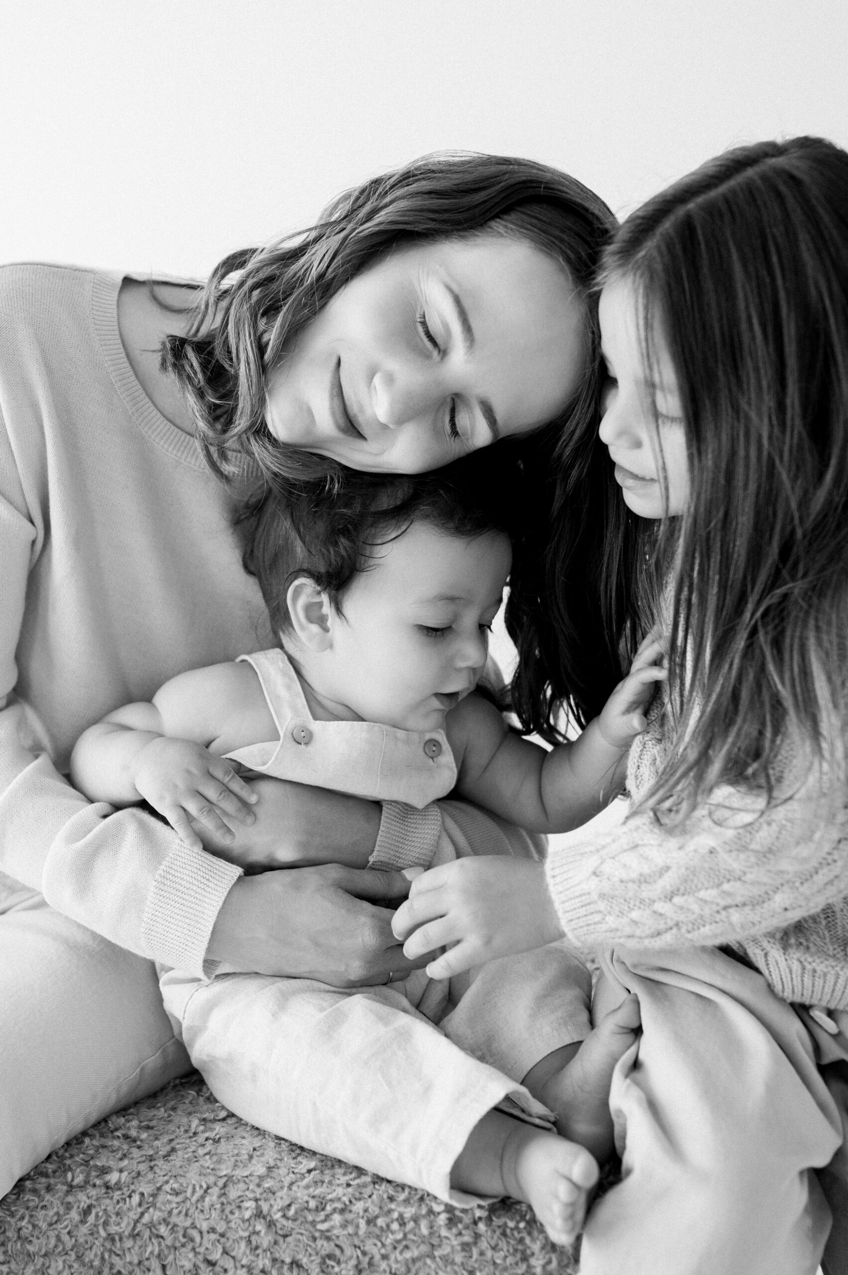 Black and white cozy family portrait in Miami