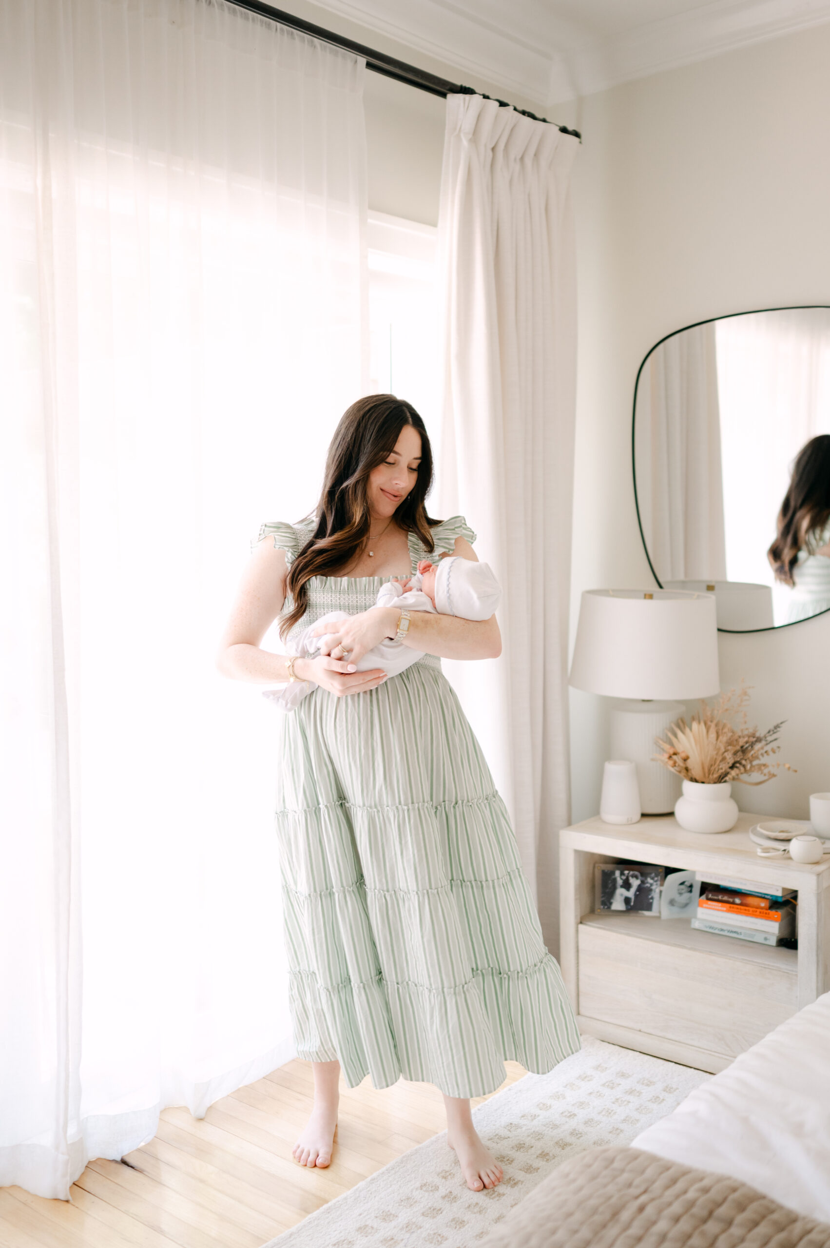 Mom rocking her baby in her MIami home