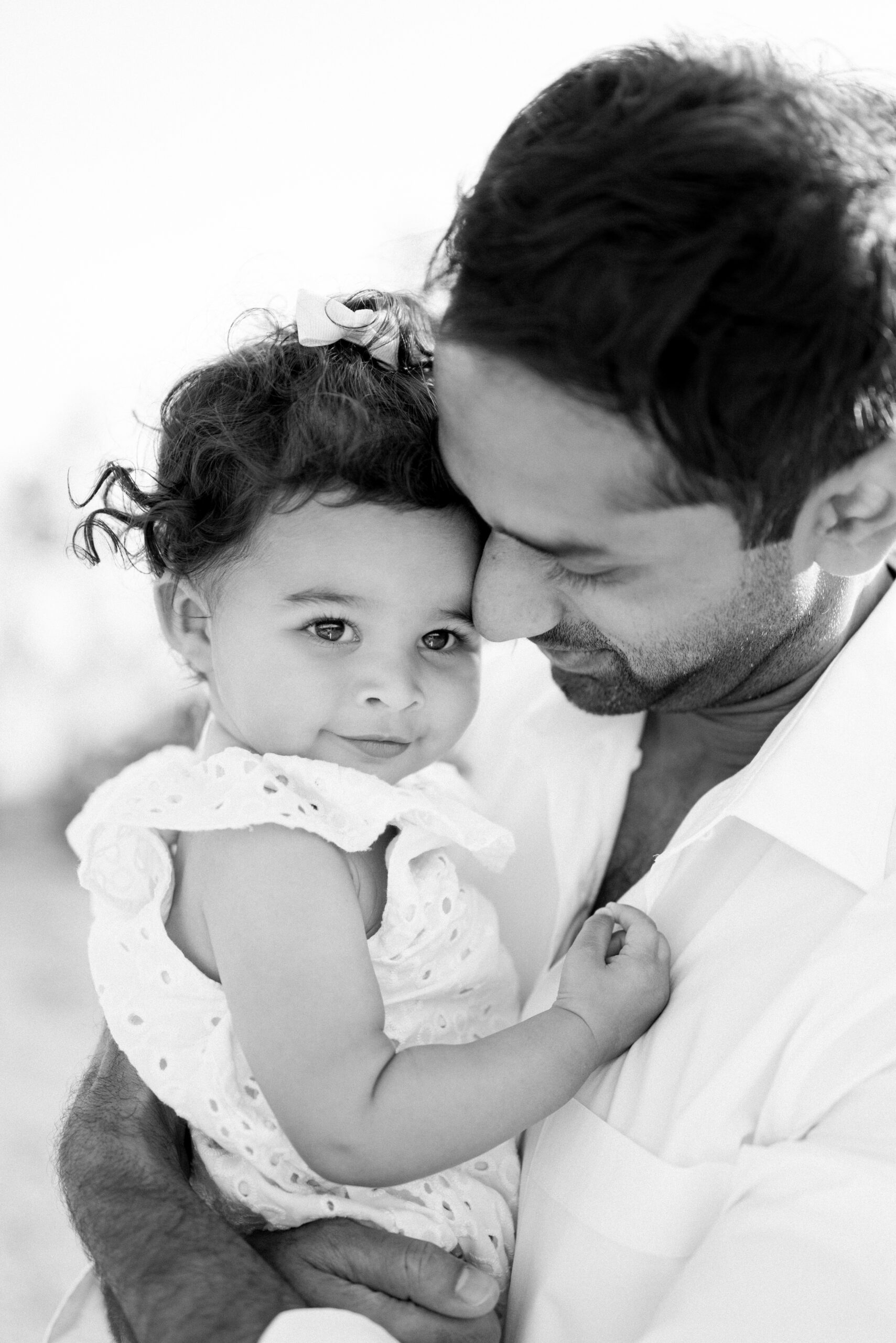 Dad hugging daughter during Miami photoshoot