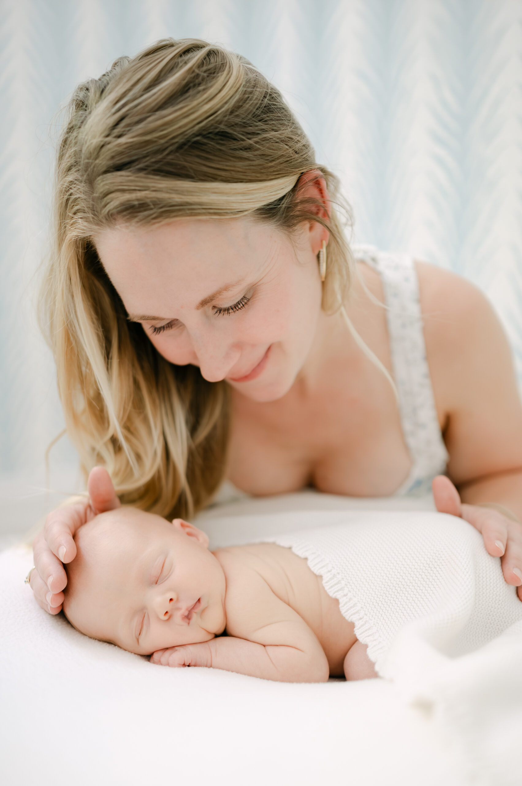 Intimate moment mother and newborn baby natural light South Florida 